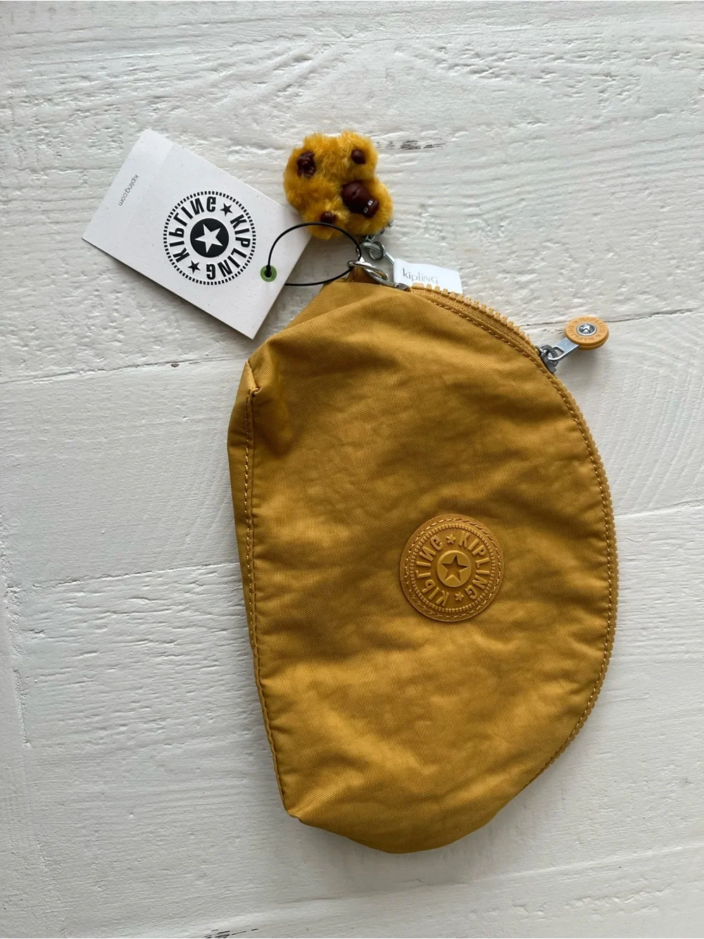 Kipling Mustard Yellow Pouch with Monkey Charm 9X6 Great size.